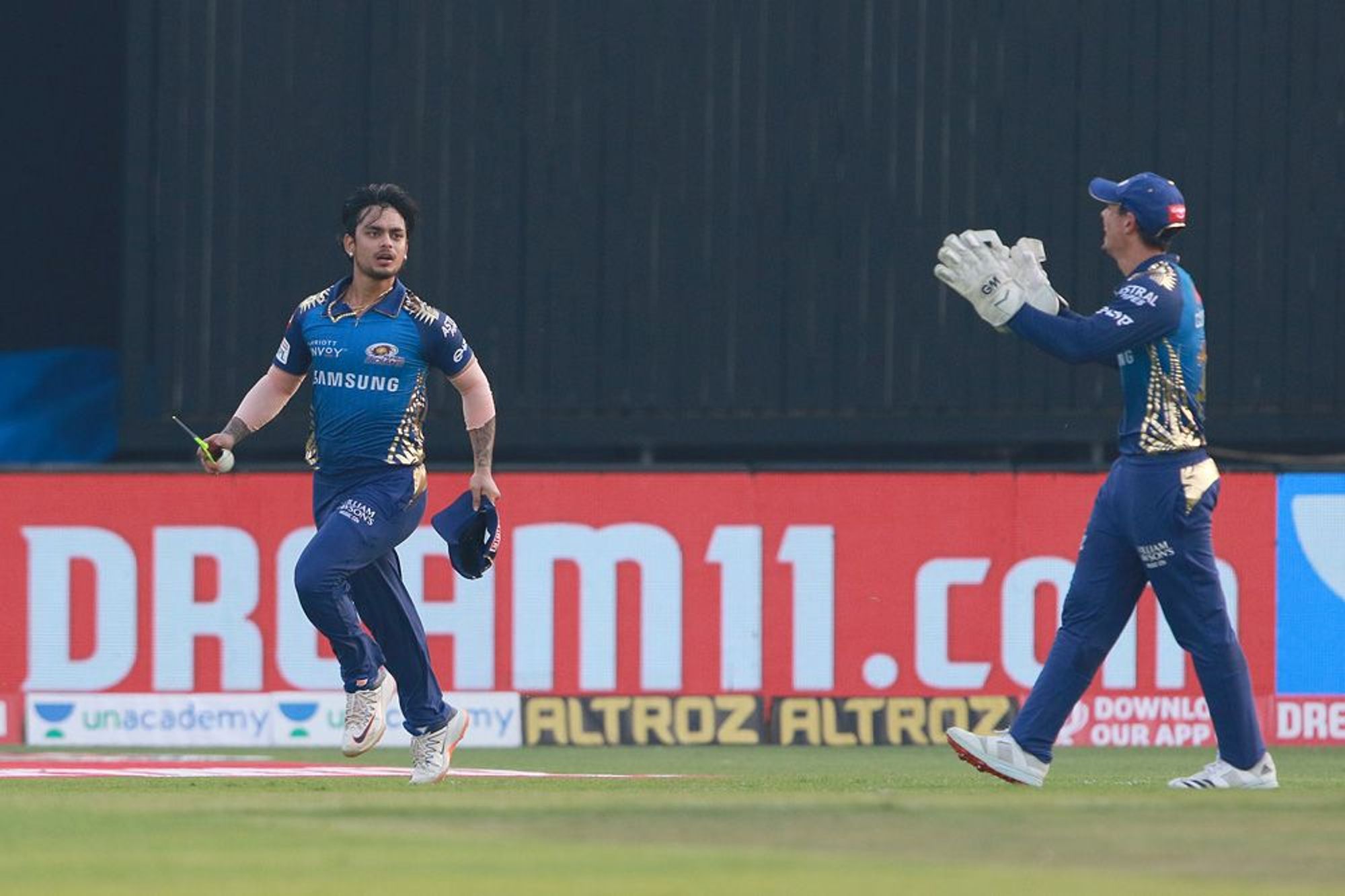 Ishan Kishan celebrates after taking a blinder