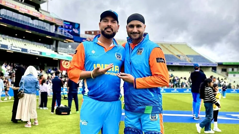 Yuvraj Singh and Harbhajan Singh of India Champions